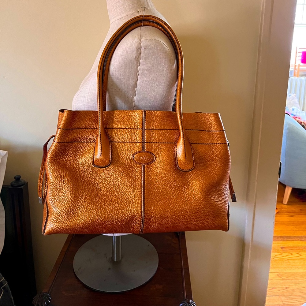 Tod’s Classic “D” Bag in Gold Metallic Pebble Leather